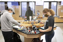 Students perform spectral analysis on colored liquids in the chemistry 109 lab. Chemistry Labs in Ha
