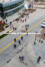 A constant flow of people go to and from Pinnacle Bank Arena at Wednesday’s vaccine clinic. More t