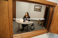 Brenna Lash, a graduate student in the Clinical Psychology Training Program, loads the telehealth pl