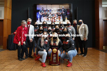 The Husker Bowling Team poses with their NCAA Bowling trophy. Chancellor Ronnie Green and Jane Green