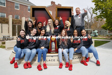 The Husker Bowling Team poses with their NCAA Bowling trophy. Chancellor Ronnie Green and Jane Green