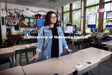 Sydney Trench, an elementary education major, poses in an elementary classroom for an ASEM recruitme