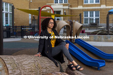 Brianna Miller, an elementary and early childhood education major, poses on a playground an ASEM rec