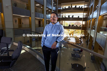 Ra’Daniel Arvie, a junior management major, pictured inside the Howard Hawks Hall (College of Busi