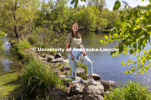 Malayna Wingert, a junior Biological Systems Engineering major. Pictured by a lake for ASEM recruitm