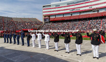 Air Force, Navy Marine and Army ROTC cadets recite the oath of enlistment at the beginning of the mo