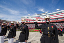 Marine ROTC cadets recite the oath of enlistment at the beginning of the second commencement. The ca