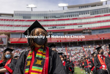 Alissa Clarke watches a video on the screens during the morning commencement. UNL Commencement in Me