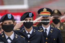 New Army Second Lieutenants including Taylor Butalla salute the color guard at the beginning of the 