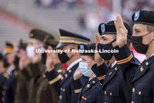 New Army Second Lieutenants including Tyler Mona recite the oath of enlistment at the beginning of t