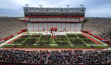 Education and Human Sciences degree candidates line up to receive their diplomas. The university con