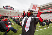 Vanessa Reiser gestures to her family and friends in the stadium after receiving her biological scie