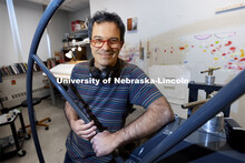 Francisco Souto works on a commissioned artwork in his Richards Hall studio. His intricate drawing w