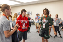 Students interact with each other as they discuss their likes and interests. New Student Enrollment 