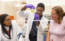 McNair scholar Seth Caines, center, and summer research scholar Moriah Brown from Howard University 