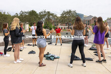 Orientation leader, Lucy Peterkin leads the New Student Enrollment group in an ice-breaking exercise
