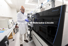 Assistant Director Mike Naldrett works in the Proteomics and Metabolomics lab in Beadle Hall. Nebras