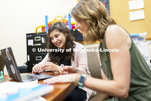 Lisa Knoche and McNair Scholar, Evelyn Estrada-Gonzalez are researching parent-child Interaction and