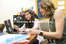 Lisa Knoche and McNair Scholar, Evelyn Estrada-Gonzalez are researching parent-child Interaction and