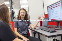 Dorian Bobbett and Professor Grace Panther discuss Bobbett’s McNair Scholar research project. July