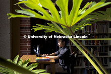Daniel Nguyen, McNair scholar and senior in psychology, studies in Love Library. July 28, 2021. 