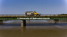 A Nebraska Department of Transportation truck drives across the aging Platte River Bridge as sensors