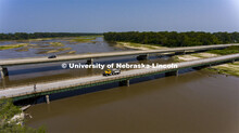 A Nebraska Department of Transportation truck drives across the aging Platte River Bridge as sensors