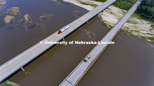 A Nebraska Department of Transportation truck drives across the aging Platte River Bridge as sensors