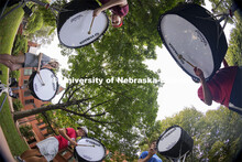 The Cornhusker Marching Band percussion groups kick off the school year. Base drums practice in the 