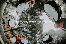 The Cornhusker Marching Band percussion groups kick off the school year. Base drums practice in the 