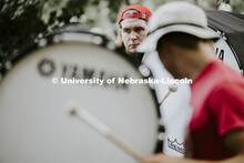 The Cornhusker Marching Band percussion groups kick off the school year. Alaric Schiltz and the othe