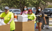 Gianna Smith, an Emerging Leader, moves in Sunday with the help of older sister, Noele, who graduate