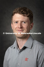 Studio portrait of Gavin Cotterill, Research Assistant Professor, Wildlife Disease Ecologist, School