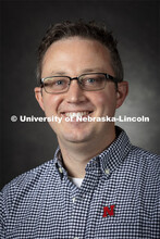 Studio portrait of Jason Stamm, Assistant Professor, College of Journalism and Mass Communications. 