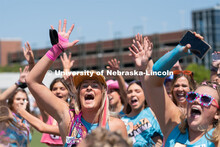 Sororities celebrate the arrival of new members during Sorority Rush Bid on the Vine Street fields. 