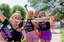 Students pose for photos during Sorority Rush Bid on the Vine Street fields. Sorority bid day recrui