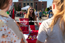 Students talk to local clubs and businesses during the Big Red Welcome Street Festival. The Street F
