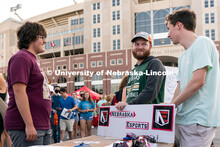 Students talk to local clubs and businesses during the Big Red Welcome Street Festival. The Street F