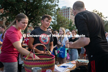 Students talk to local clubs and businesses during the Big Red Welcome Street Festival. The Street F