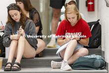 The last students in the door of Chemistry 110 lecture in Hamilton Hall chose to sit on the steps ra