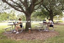 Studying under the trees outside Hardin Hall. First day of classes for fall semester. August 23, 202