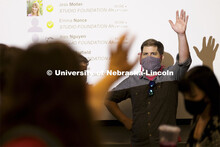 Byron Anway, Assistant Professor of Practice in the School of Art, waves to one of his students at t