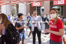 Chancellor Ronnie Green talks to Josh Rodriguez at the Inaugural Soph S’more Social outside of the