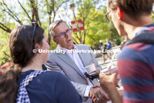 Chancellor Ronnie Green talks with students at the Inaugural Soph S’more Social outside of the Neb