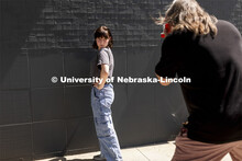 Olivia Jenkins, a sophomore from Lincoln, poses for her photo being taken by Sean Strough, Equipment