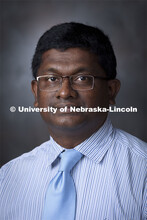 Studio portrait of Thulitha Wickrama, Senior Research Associate for Child, Youth and Family Studies.