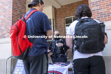 UNL police officers talk with students at the Campus Safety Awareness Fair outside the Nebraska Unio