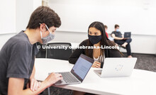 Students talk over their scenarios in the Human - Computer Contact robotics course taught by Brittan
