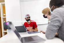 Students talk over their scenarios in the Human - Computer Contact robotics course taught by Brittan