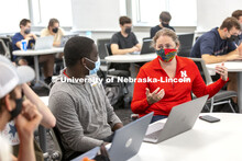 Students talk over their scenarios in the Human - Computer Contact robotics course taught by Brittan